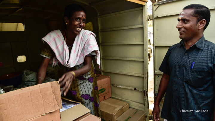 Man and woman loading van
